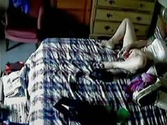 Hidden cam caught a masturbation action of a crazy wife in her bedroom 